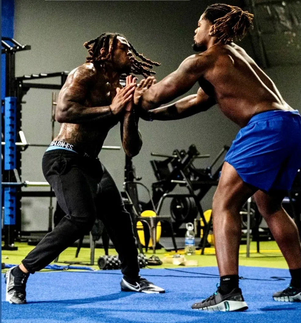 Two athletes drilling hand-fighting and combat-style skills at Texas Athletics USA in Houston